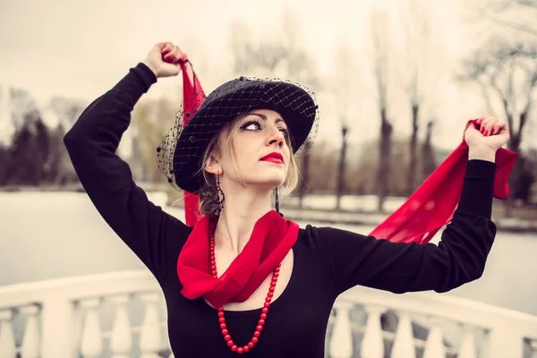 Young pretty sexy lady in black dress outdoor — Stock Photo, Image