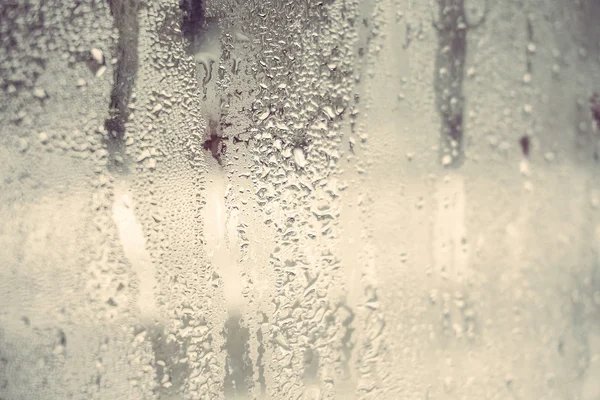 Вода падає на вікно, шпалери — стокове фото