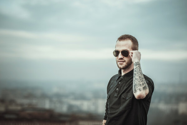 Man on the roof of the high building