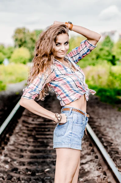 Young girl on the railroad — Stock Photo, Image