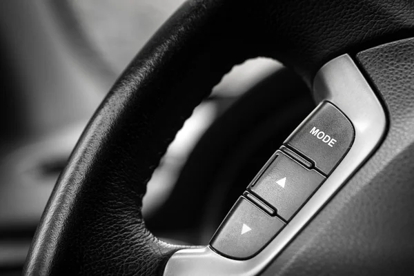 Driving wheel with music media buttons — Stock Photo, Image