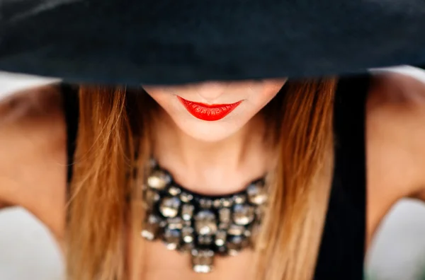 Portrait of young pretty  woman in black hat — Stock Photo, Image