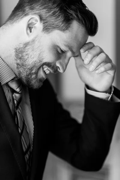 Handsome businessman  smiling — Stock Photo, Image