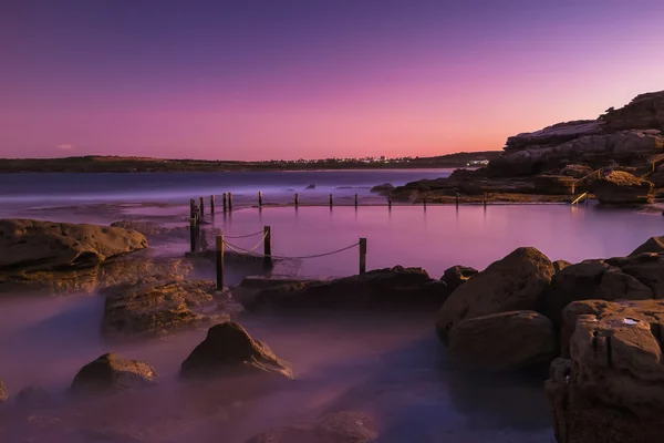 Zonsondergang op de rock pool op Maroubra strand — Stockfoto