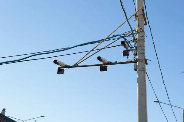 Road cameras fixing excess speed installed on the pole. DVRs at an intersection, bottom view