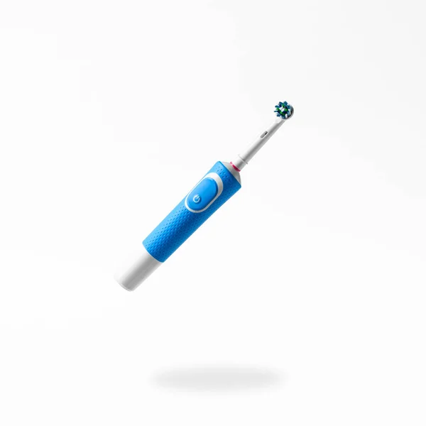 Schwebende Blaue Elektrische Zahnbürste Auf Weißem Hintergrund Modernes Werkzeug Für Stockbild