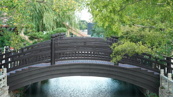 The old bridge built in the Chinese garden