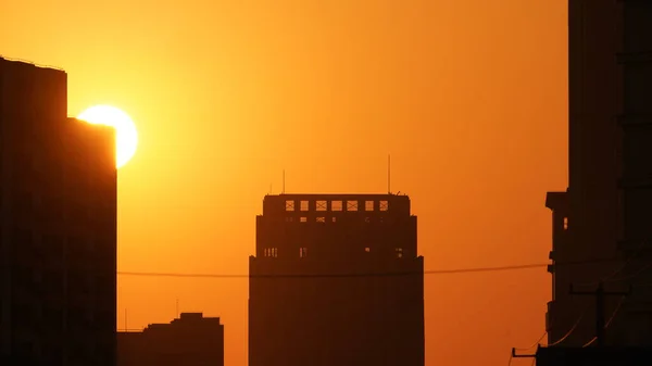 The beautiful sunset cityscape with the buildings and sunset view in the city