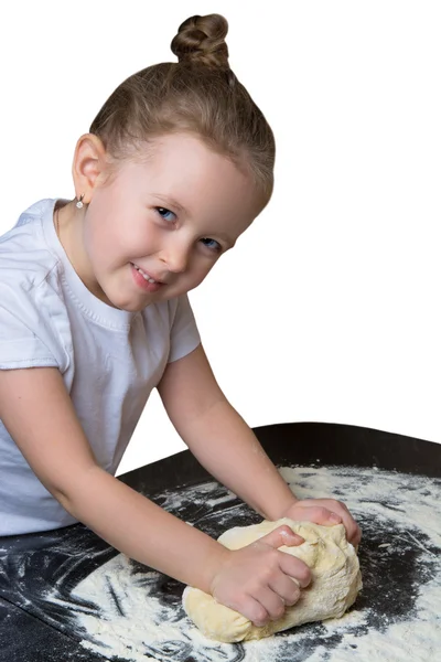 Little girl kneads the dough — Stock Photo, Image