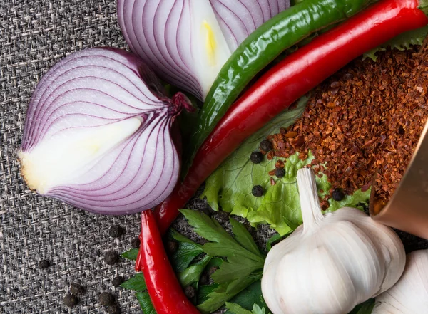 Peppers with garlic and fresh herbs — Stock Photo, Image