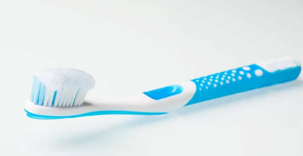 Toothbrushes on the glass table — Stock Photo, Image