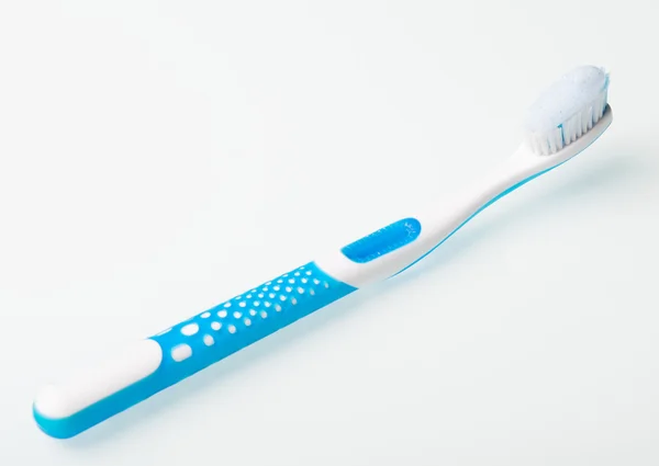 Toothbrushes on the glass table — Stock Photo, Image