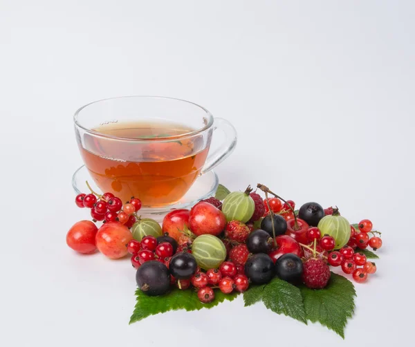 Sweet black tea with berry Stock Photo