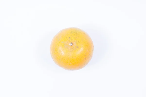 Sladké oranžové plody na bílém pozadí. — Stock fotografie