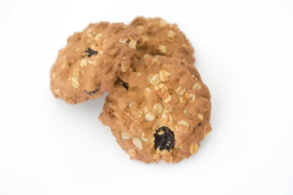 Homemade cookie with oat flakes on white background. — Stock Photo, Image