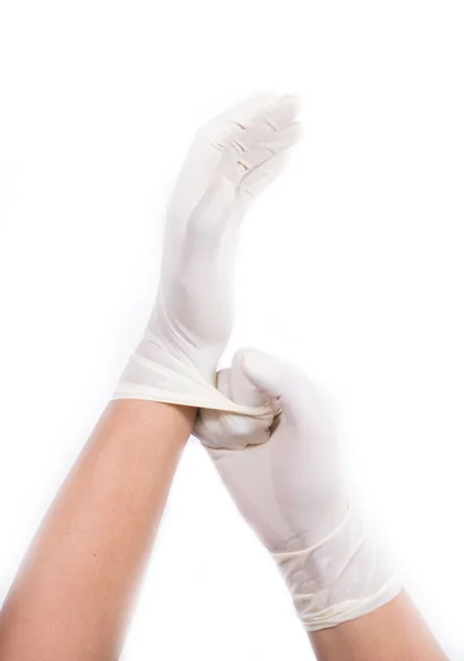 Ręce rękawice chirurgiczne. na białym tle — Zdjęcie stockowe