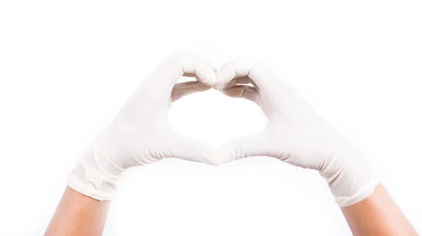 cerrahi eldiven ellerinde. Beyaz arka plan üzerinde izole