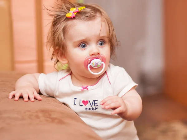 Little girl with a pacifier — Stock Photo, Image