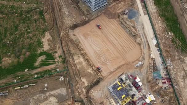 Modern urban development. Construction site with multi-storey buildings under construction. Construction work is underway. Aerial photography — Stock Video