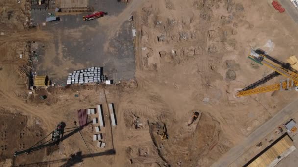 Construction of a sports arena. There is a football stadium nearby. Aerial photography. — Vídeo de Stock