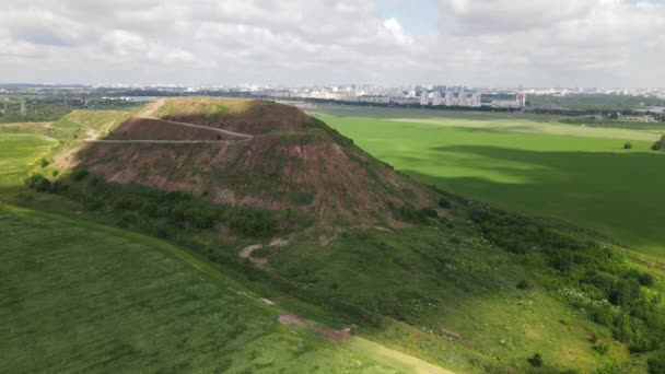 Household waste landfill. Closed for processing. Environment protection. Asteroid effect. Aerial photography. — Stock Video