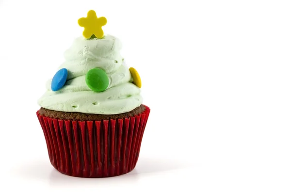 Cupcake com creme verde isolado no fundo branco — Fotografia de Stock