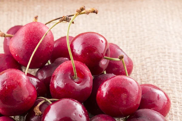 Heart shaped cherry isolated on background — Stock Photo, Image