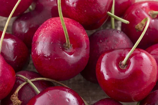 Heart shaped cherry isolated on background — Stock Photo, Image