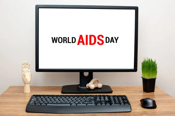 Monitor screen on desk World AIDS Day Concept.