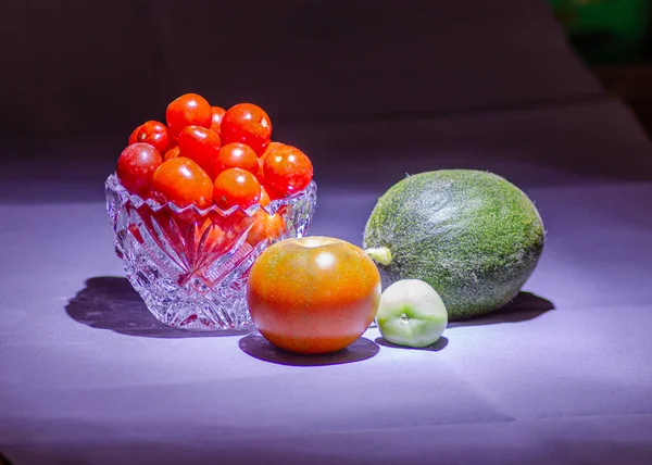 still life with tomatoes and zucchini