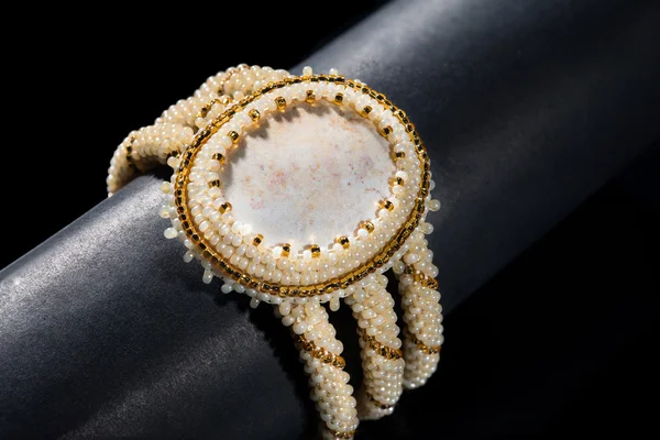 Yellow beaded bracelet with stones — Stock Photo, Image