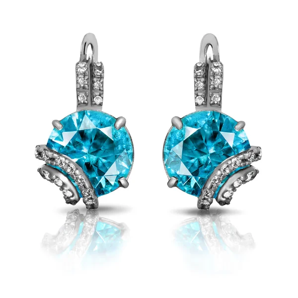Jewelry. Silver earrings with diamonds and sapphires — Stock Photo, Image