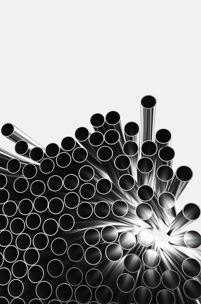 Close-up of metal pipes on a white background. A pile of iron pipes isolated on a white background. 3d render illustration