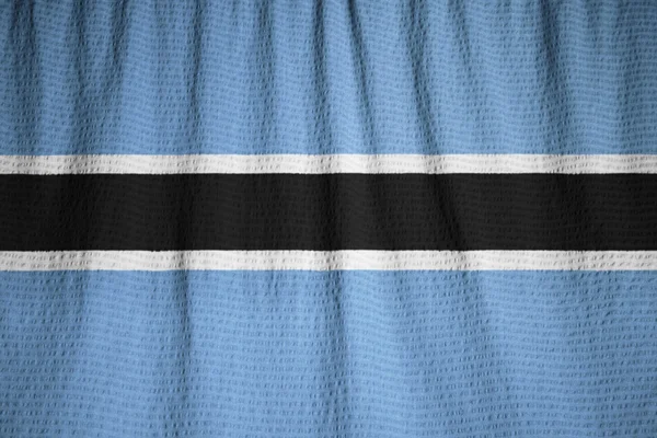 Nahaufnahme von geraffter Botswana-Flagge, Botswana-Flagge weht im Wind — Stockfoto