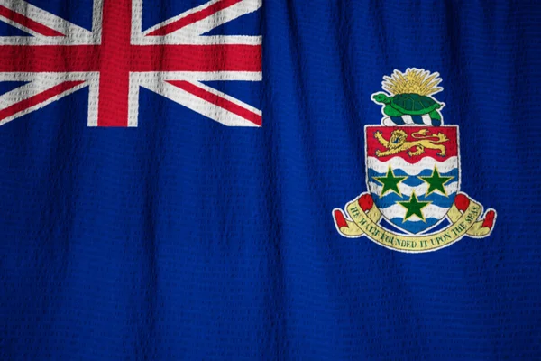 Primer plano de la bandera de las Islas Caimán con volantes, bandera de las Islas Caimán — Foto de Stock