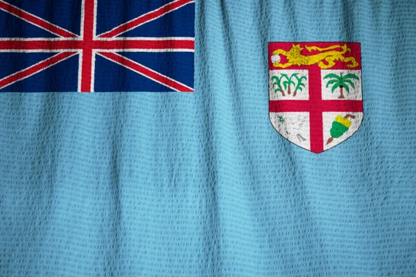 Primer plano de la bandera de Fiyi con volantes, bandera de Fiyi soplando en el viento — Foto de Stock