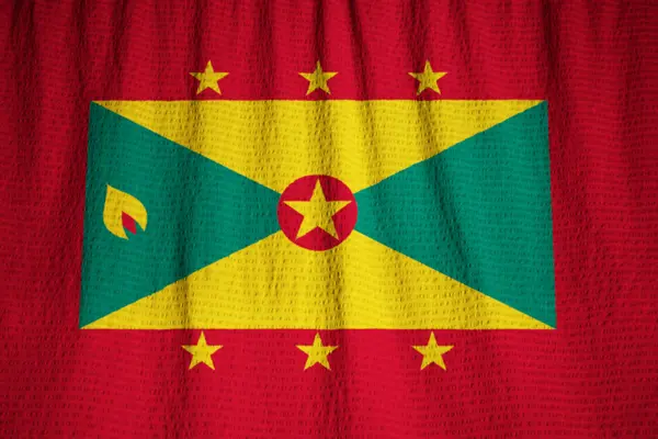 Closeup of Ruffled Grenada Bandeira, Granada Bandeira Soprando no Vento — Fotografia de Stock