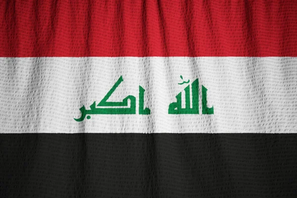 Closeup da bandeira de bandeira, Iraque Iraque babados soprando no vento — Fotografia de Stock