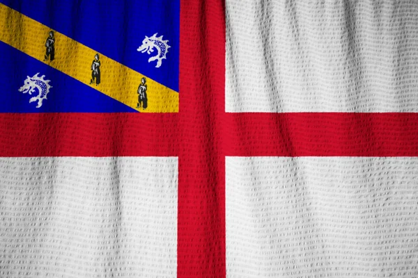 Closeup de Ruffled Herm Bandeira, Herm Bandeira soprando no vento — Fotografia de Stock