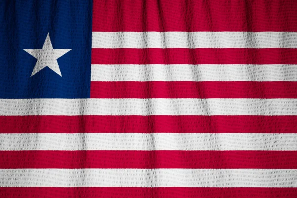 Vértes fodros Libériai zászló, Libéria zászló fúj a szél — Stock Fotó