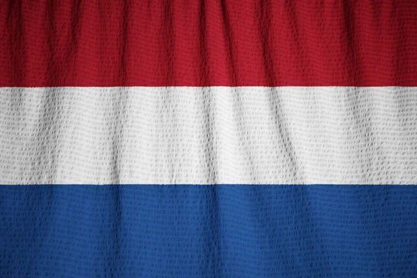 Close-up van gegolfde Nederland vlag, Nederlandse vlag — Stockfoto