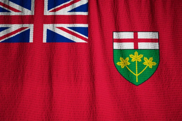 Primer plano de la bandera de Ontario con volantes, bandera de Ontario soplando en el viento — Foto de Stock