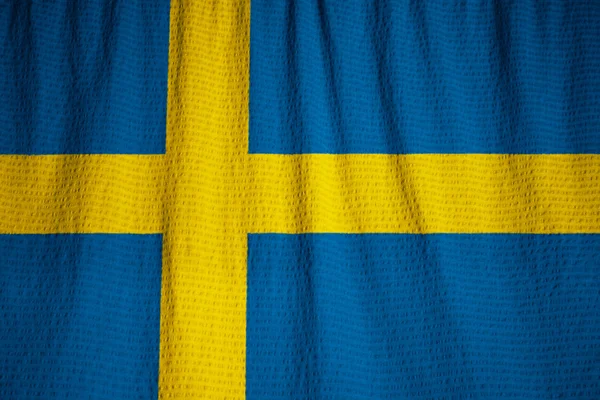 Closeup of Ruffled Sweden Flag, Sweden Flag Blowing in Wind