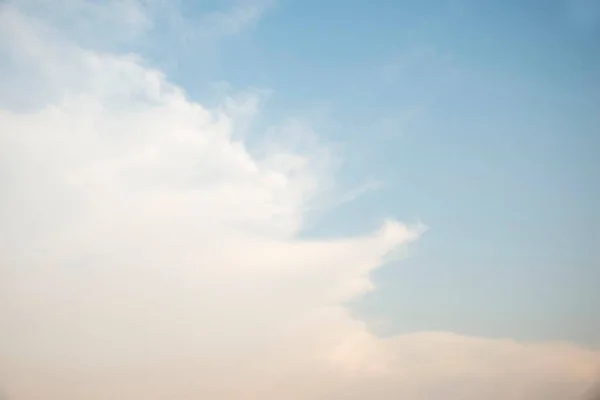 Scattered cloud clusters in a blue sky, blue sky background with white clouds,