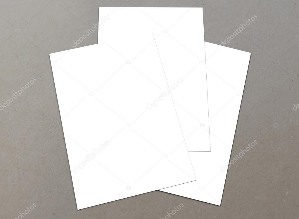 Blank white paper A-4 flyer collection on floor