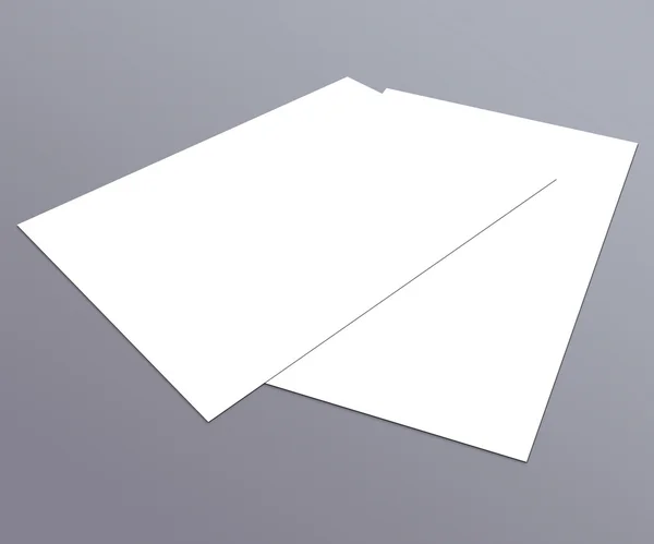 Blank white paper A-4 flyer collection on grey background — Stock Photo, Image