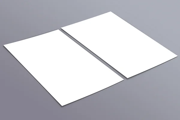 Blank white paper A-4 flyer collection on grey background — Stock Photo, Image