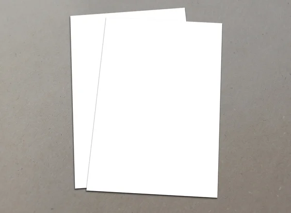 Blank white paper A-4 flyer collection on floor — Stock Photo, Image