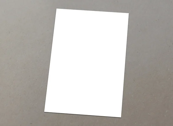 Blank white paper A-4 flyer collection on floor — Stock Photo, Image