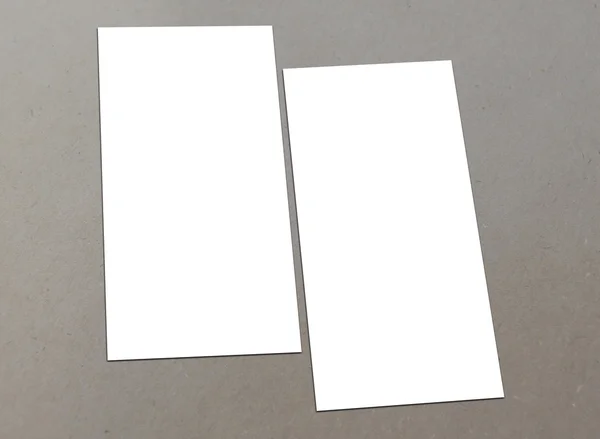 Blank white paper (4"x 8") flyer on floor — Stock Photo, Image